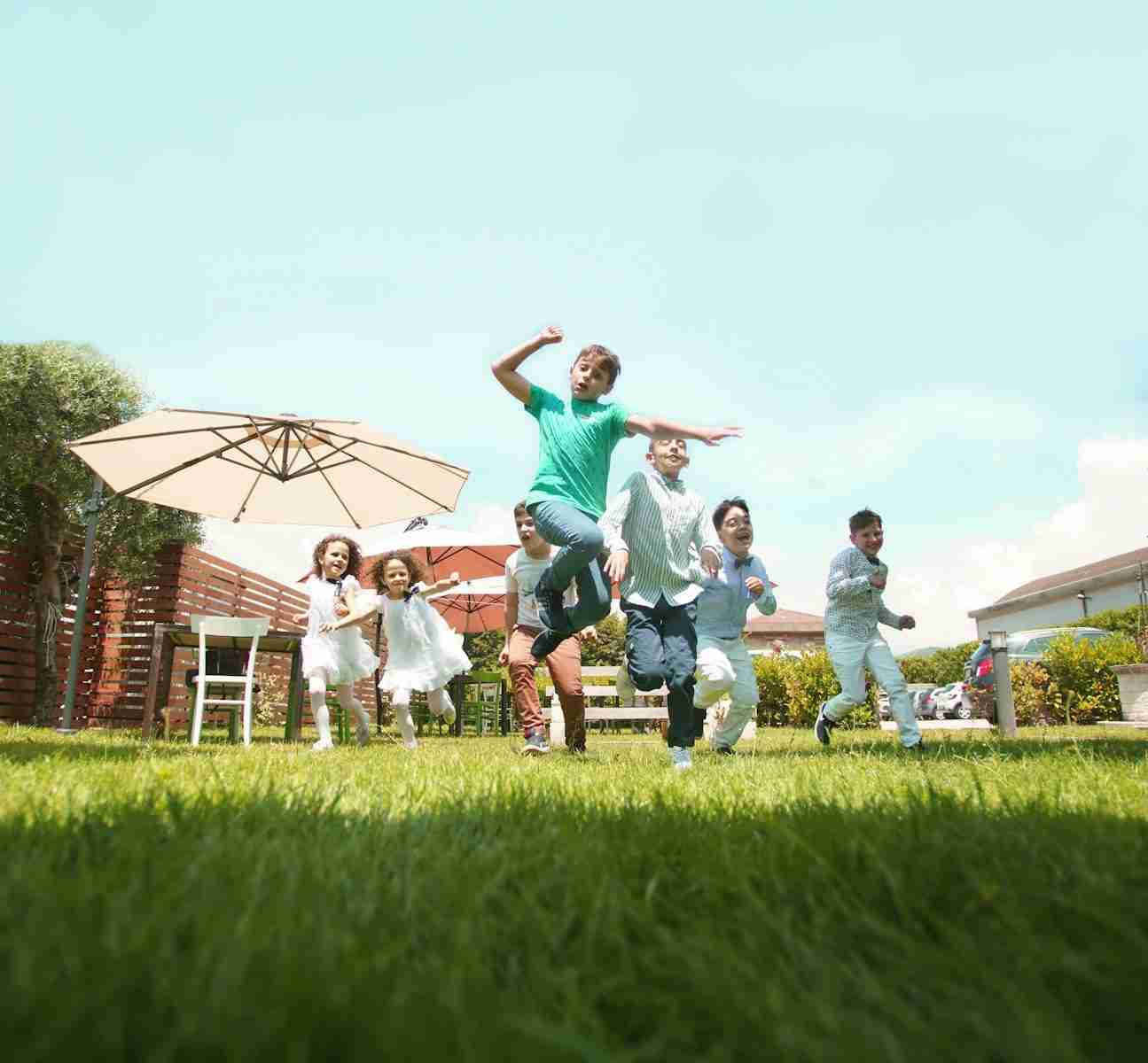 Wonderful Life people on green grass field during daytime